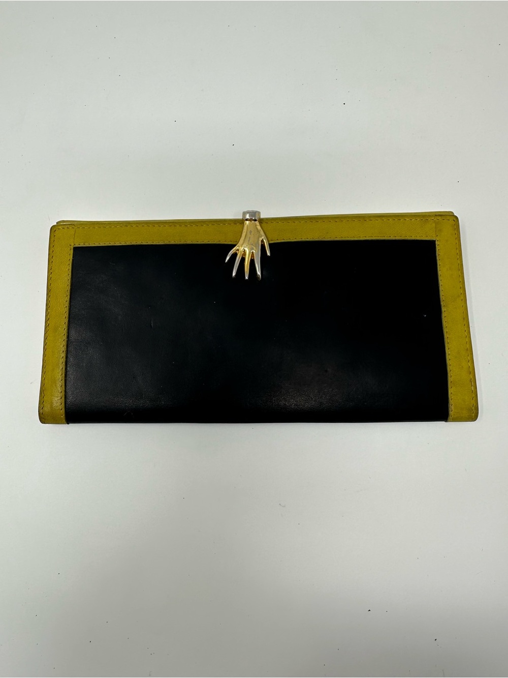 Gucci yellow and black leather wallet with hand clasp